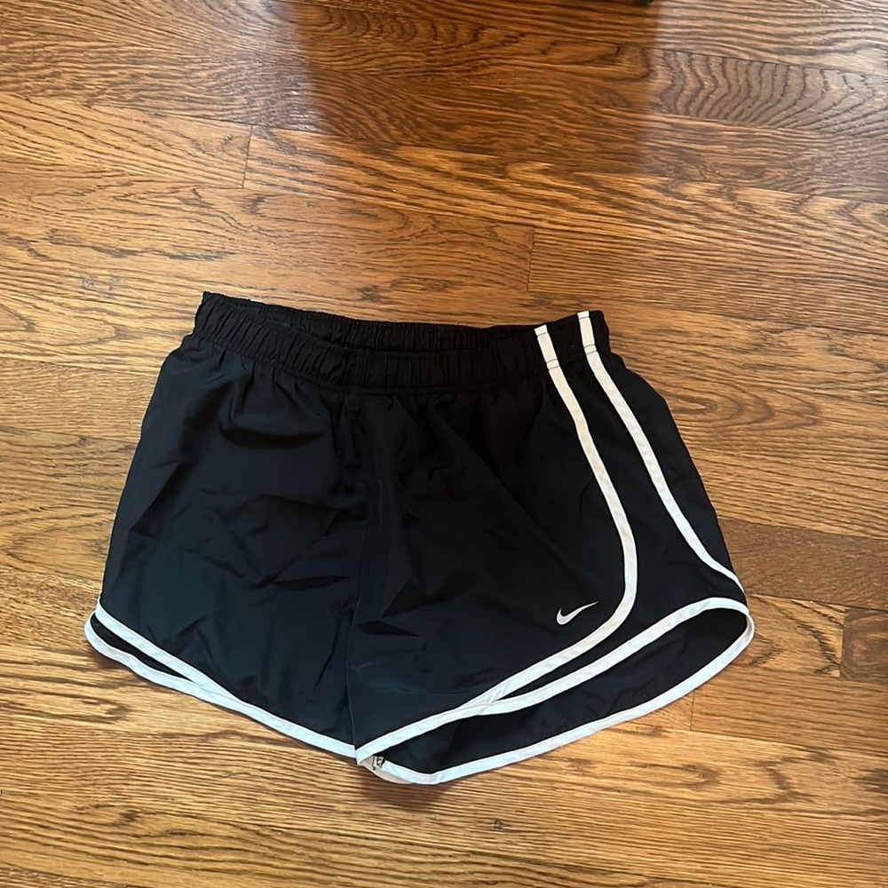 Black and white Nike running shorts